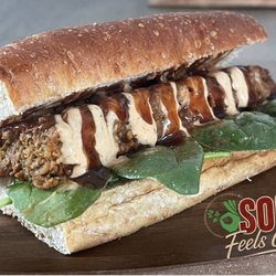 Soul Feels Good Vegan Garden - Rib Sandwhich with our signature Supreme Sauce, BBQ sauce and spinach on a whole wheat roll.
