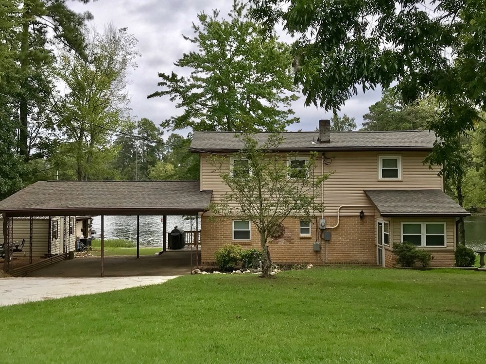Slide of The Red Shirt Guys Roofing