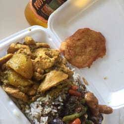 Tweedy's Jamaican Patties & Restaurant - Delicious jerk pork and curry chicken combo.