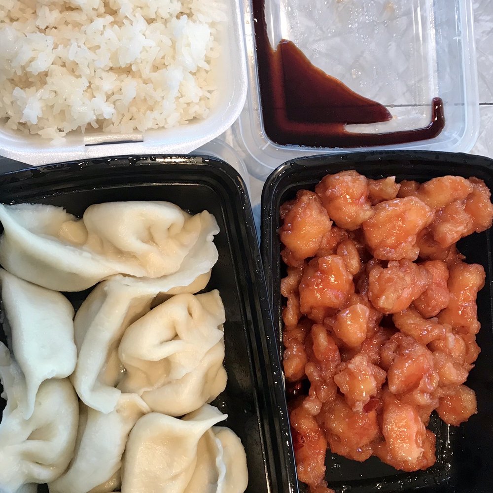 Chopstix Chinese Cuisine - Dumplings, rice and General Tso's chicken(already taken a portion out so it comes with a lot more than pictured here) - Chinese Near Me - Springfield, Oregon