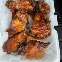 AJ's Cheesesteaks - Wings with AJ sauce. Very good. Crispy.