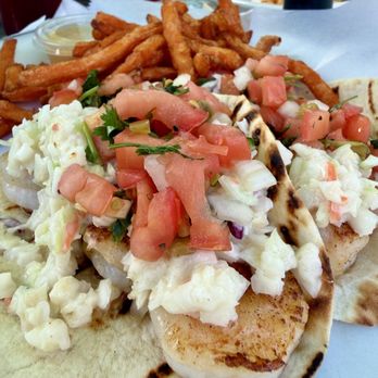 Toucan’s Lakefront Restaurant - Grilled shrimp tacos with sweet potato fries (honey mustard dipping sauce). - New American Near Me - Mooresville, North Carolina Toucan’s Lakefront Restaurant - Grilled shrimp tacos with sweet potato fries (honey mustard dipping sauce). - New American Near Me - Mooresville, North Carolina