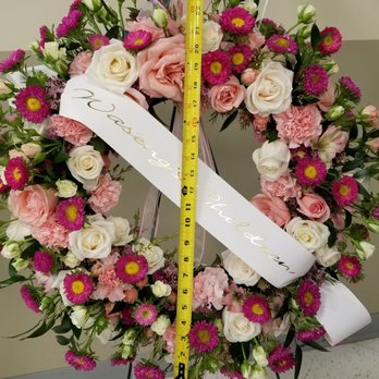 A Johnson & Sons Florist - After the florist came out to fix it. Still not 27 inches, nor looking like this online picture anymore. - Florists Near Me - St Paul, Minnesota A Johnson & Sons Florist - After the florist came out to fix it. Still not 27 inches, nor looking like this online picture anymore. - Florists Near Me - St Paul, Minnesota