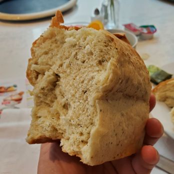 Tornado Steak House - Rosemary bread for our party of 2. They will give you a whole loaf and a biscuit. - Steakhouses Near Me - Madison, Wisconsin