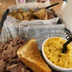 Pearl Country Store & Barbecue - Between the two baskets is a jumbo order of beef brisket. 10oz. of beef, 2 sides and a piece of toast.