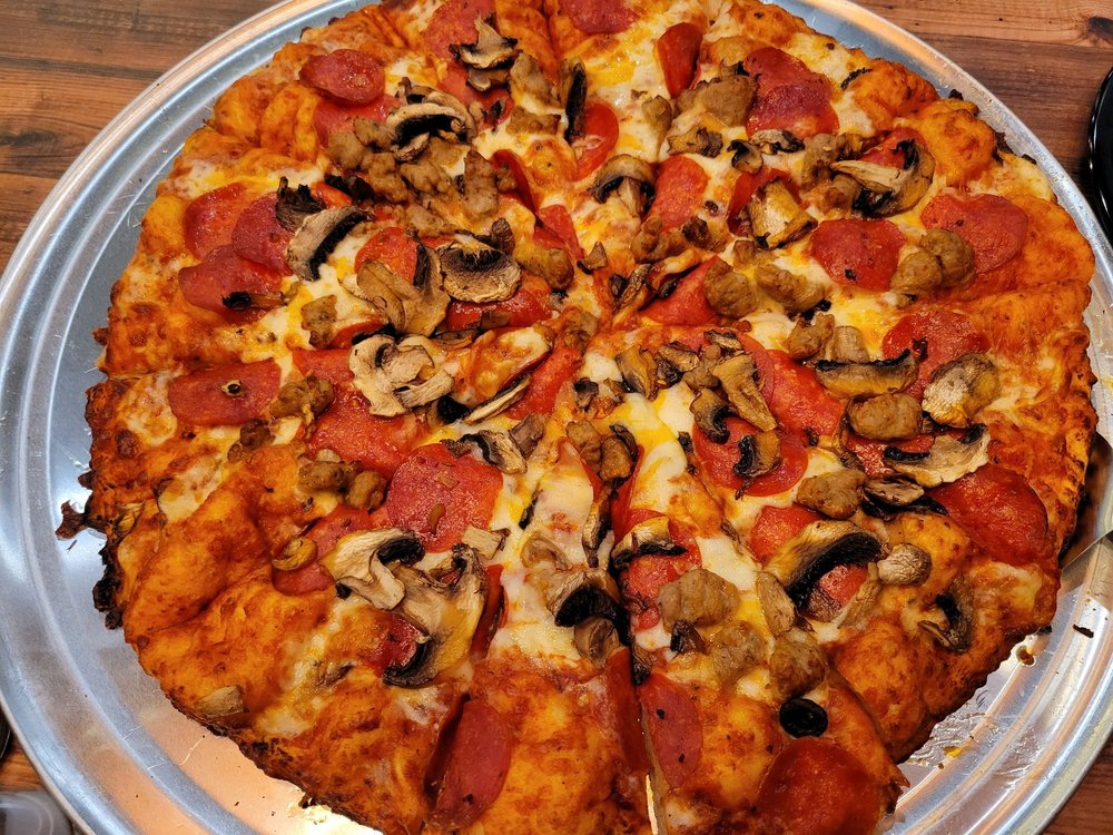 ROUND TABLE PIZZA with 75 real customer photos Updated August 2024