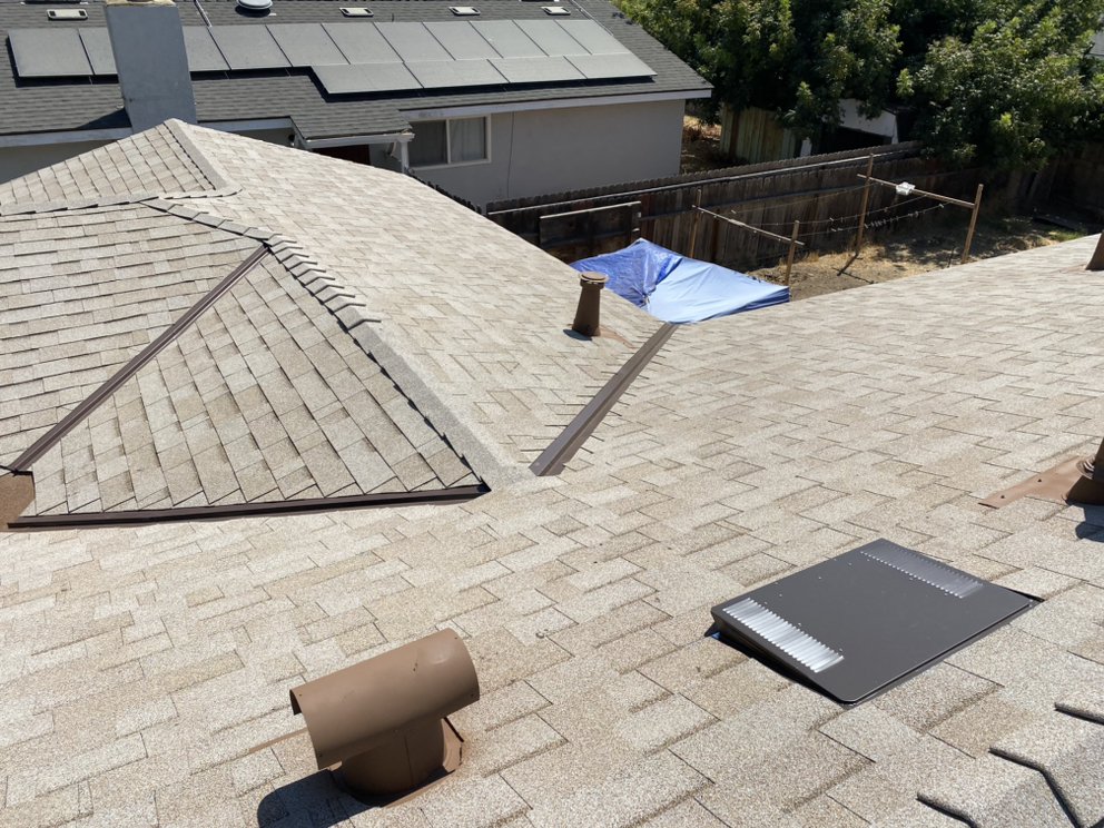 Slide of Modern Roofers and Restoration