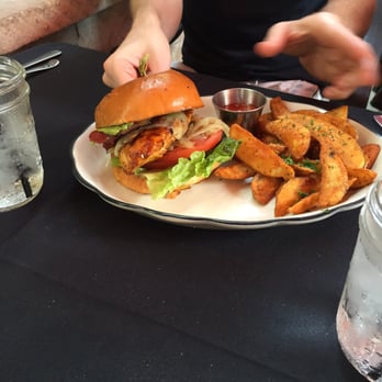 Moonshine Grill - Chicken sandwich w wedge fries. Soooooo freaking good - Southern Near Me - Austin, Texas