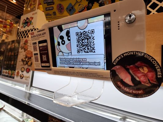 Kura Revolving Sushi Bar by null