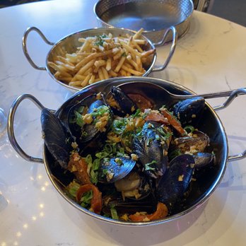 Bootleg Special - Mussel bowl in bootleg sauce with garlic fries - Cajun/Creole Near Me - Boston, Massachusetts
