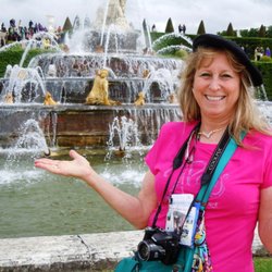 Sun Tours & Travel - Nancy being French, at the Palace of Versailles, France. We could have hung around here forever.