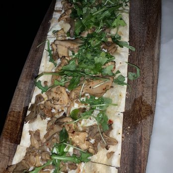 Gatsby's Landing - Great Appetizer with cheese, mushrooms, truffle sauce and arugula - New American Near Me - Roslyn, New York