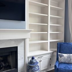 Wade Brothers Carpentry - Built-in shelves and fireplace mantle.