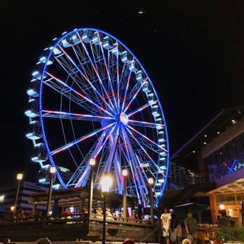Waterside District - Red, white, and blue SkyStar Ferris wheel during 4th of July! - Sports Bars Near Me - Norfolk, Virginia Waterside District - Red, white, and blue SkyStar Ferris wheel during 4th of July! - Sports Bars Near Me - Norfolk, Virginia