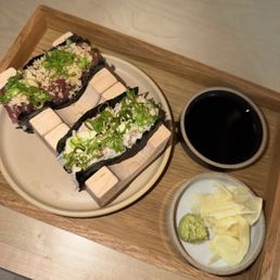 Tuna wasabi handroll (tasted like straight wasabi), and crab. Soy sauce is extra salty Tuna wasabi handroll (tasted like straight wasabi), and crab. Soy sauce is extra salty