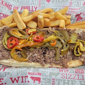 The Cheese Steak Shop - Classic Philly Cheese Steak w/ American Cheese, Onions, Hot Peppers, Sweet Peppers + Steak Fries w/ Guylic Spice - Sandwiches Near Me - San Francisco, California The Cheese Steak Shop - Classic Philly Cheese Steak w/ American Cheese, Onions, Hot Peppers, Sweet Peppers + Steak Fries w/ Guylic Spice - Sandwiches Near Me - San Francisco, California