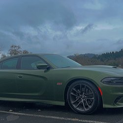 Les Schwab Tire Center - Skyline , clouds , forest , dodge Charger, tires
