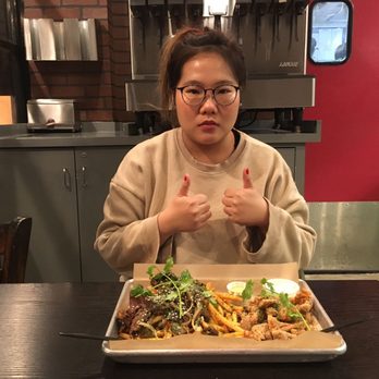 Nguyen's Kitchen - We had the Cajun Garlic Fries with Bulgogi Steak and Popcorn Chicken. Nice. - Vietnamese Near Me - Orange, California