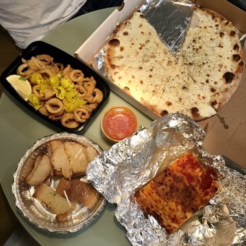 Café Bello - Bianca al Prosciutto Crudo pizza and Calamari alla Toscana - Italian Near Me - Bayonne, New Jersey