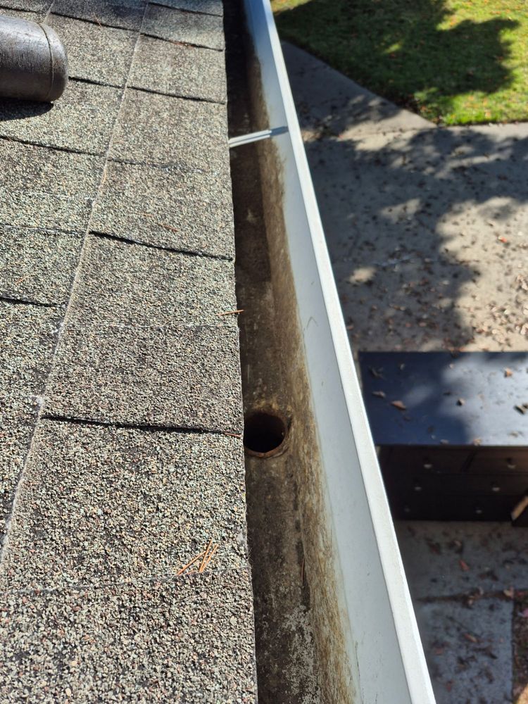 Slide of Cleaning Gutters Service