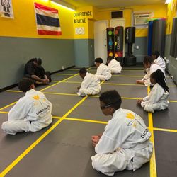 Dragonfly Martial Arts & Fitness - Stretching during our Juniors Class.