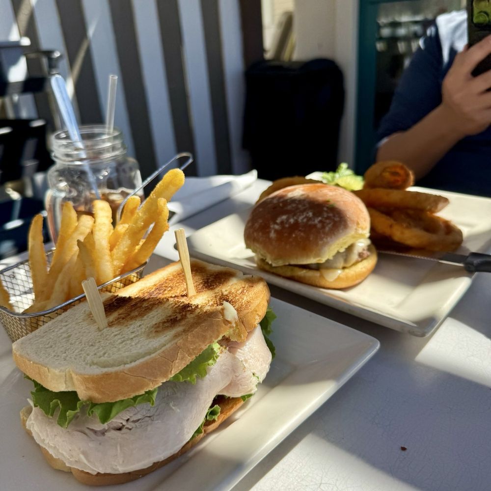 The Grill - Turkey Sandwich (foreground) and Burger (background) - American Near Me - Lone Pine, California The Grill - Turkey Sandwich (foreground) and Burger (background) - American Near Me - Lone Pine, California