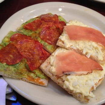 Il Bambino - Avocado butter, chorizo chili oil crostini/ Truffle egg salad and shaved speck - Italian Near Me - Astoria, New York