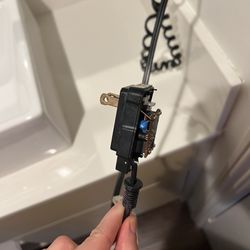 Quality Inn University - The broken wiring for the blowdryer
