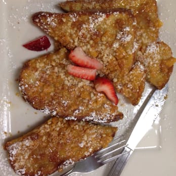 Scramblers Cafe - Captain mac'nut French toast, so crispy and good, especially with the coconut icing - Breakfast & Brunch Near Me - Norco, California Scramblers Cafe - Captain mac'nut French toast, so crispy and good, especially with the coconut icing - Breakfast & Brunch Near Me - Norco, California