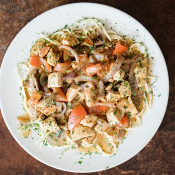 American Grill - a plate of pasta with chicken and vegetables - American Near Me - Port Huron, Michigan