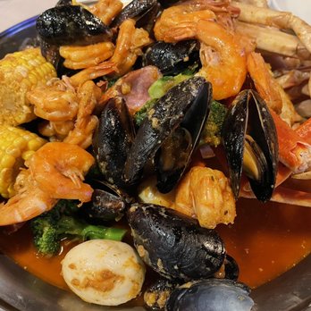 Storming Crab - Snow Crab, Shrimp Head Off, Black Mussels, Broccoli, Eggs and Corn... sauce was "mix of all three" and Hot. Sooo good! - Seafood Near Me - Henderson, Nevada