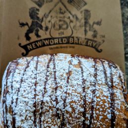 a pastry with powdered sugar on top a pastry with powdered sugar on top