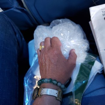 Delta Airlines - This the ice bag that a fight attendent made me for my knee. Early boarding also. - Airlines Near Me - Boston, Massachusetts