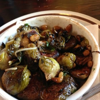 Santiago's Bodega - Oven roasted Brussels sprouts sautéed in brown sugar - Tapas Bars Near Me - Orlando, Florida Santiago's Bodega - Oven roasted Brussels sprouts sautéed in brown sugar - Tapas Bars Near Me - Orlando, Florida