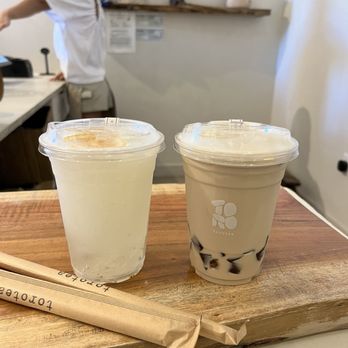 Torotea - osmanthus citrus refresher (left), koan-im oolong milk tea (right) - Coffee & Tea Near Me - Diamond Bar, California Torotea - osmanthus citrus refresher (left), koan-im oolong milk tea (right) - Coffee & Tea Near Me - Diamond Bar, California