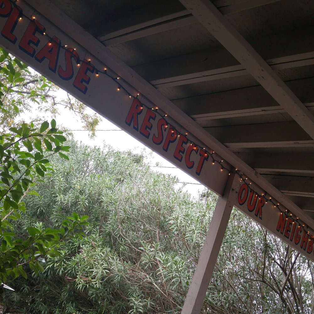 Moon Tower - Great laid back vibe with a chill atmosphere. The hot dogs are made of non traditional meats and are fantastic. - Dive Bars Near Me - Houston, Texas