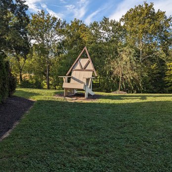 River Town Grill - A giant chair in the yard of the restaurant - Steakhouses Near Me - Williamstown, West Virginia