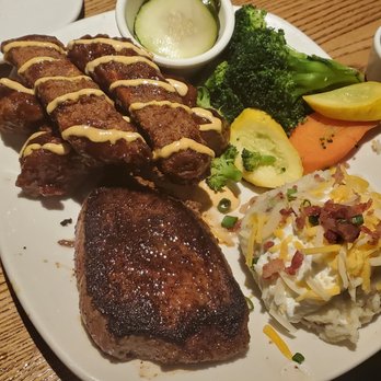 Outback Steakhouse - 6oz Steak and twisted ribs combo with loaded mashed potatoes and mixed veggies. - Steakhouses Near Me - Brandon, Florida Outback Steakhouse - 6oz Steak and twisted ribs combo with loaded mashed potatoes and mixed veggies. - Steakhouses Near Me - Brandon, Florida