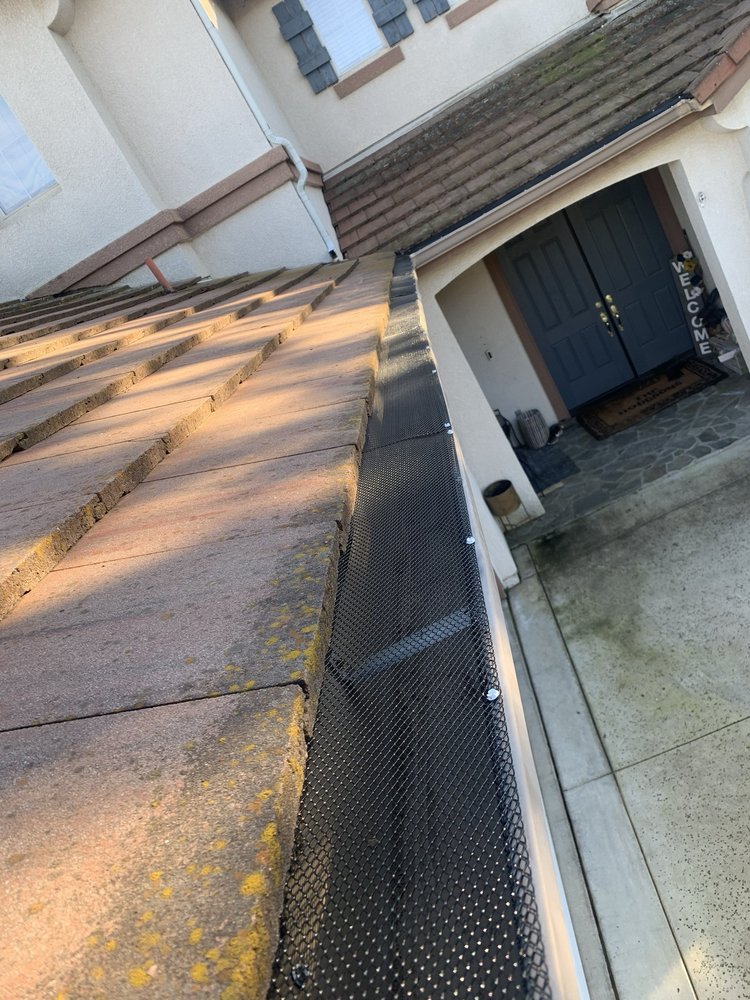 Slide of ML Gutters & Roofing