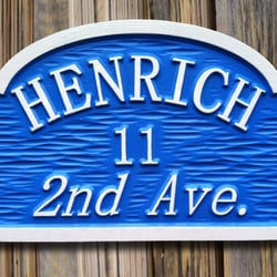 The Carving Company - http://www.thecarvingcompanyonline.com/category/address-signs