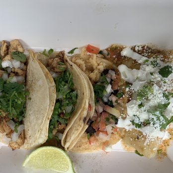 Ms Delicious - three tacos on a white plate - Food Trucks Near Me Ms Delicious - three tacos on a white plate - Food Trucks Near Me
