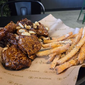 Puradak Chicken - Boneless 8 pc ($16.00) w/ Black Aglio (+$1.00), choice of fries, with corn seasoning (+$1.00) on fries - Wraps Near Me - Las Vegas, Nevada Puradak Chicken - Boneless 8 pc ($16.00) w/ Black Aglio (+$1.00), choice of fries, with corn seasoning (+$1.00) on fries - Wraps Near Me - Las Vegas, Nevada