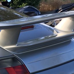 before the paint and re fiberglass work. Notice the stress cracks on the top of the spoiler.