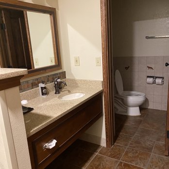 Zion Lodge - Bathroom with shower separated with sink and plenty of closet with drawers. - Hotels Near Me - Springdale, Utah Zion Lodge - Bathroom with shower separated with sink and plenty of closet with drawers. - Hotels Near Me - Springdale, Utah