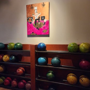 Pinstripes - bowling balls on shelves in a bowling alley - Bowling Near Me - Edina, Minnesota Pinstripes - bowling balls on shelves in a bowling alley - Bowling Near Me - Edina, Minnesota
