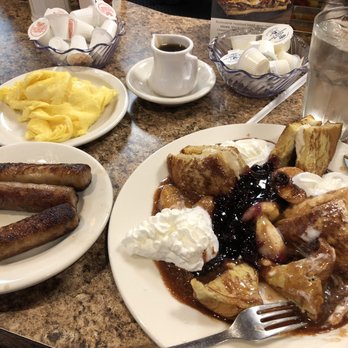 Maple N Jams Cafe - Banana Foster French Toast with glazed blueberries. An order of 3 Pieces Jumbo Sausage Links and scrambled eggs. - American Near Me - Burbank, Illinois