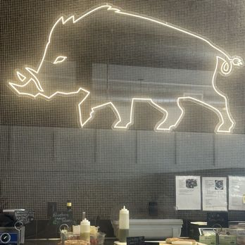 Anima Cucina - This is above the kitchen. A boar with tusk walking. - Coffee & Tea Near Me - Bismarck, North Dakota Anima Cucina - This is above the kitchen. A boar with tusk walking. - Coffee & Tea Near Me - Bismarck, North Dakota