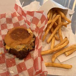 Single cheeseburger with everything on it is very tasty and the fries are really crispy
