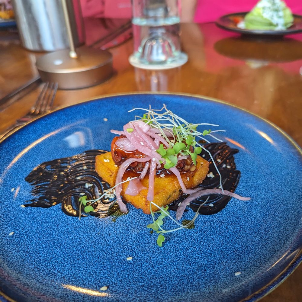 Little Pearl - Octopus with pickled onion on top of polenta - New American Near Me - Key West, Florida