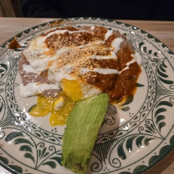 RED O - CHILAQUILES VERDES: scrambled eggs, tortilla casserole, salsa verde, refried beans, onion, radish, cilantro, crema-$18 (minus the tortillas) - Mexican Near Me - Thousand Oaks, California